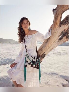 Myra bag cowhide printed leather fringe crossbody bag.